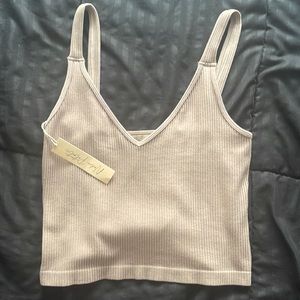 V neck tank top tags on size L
